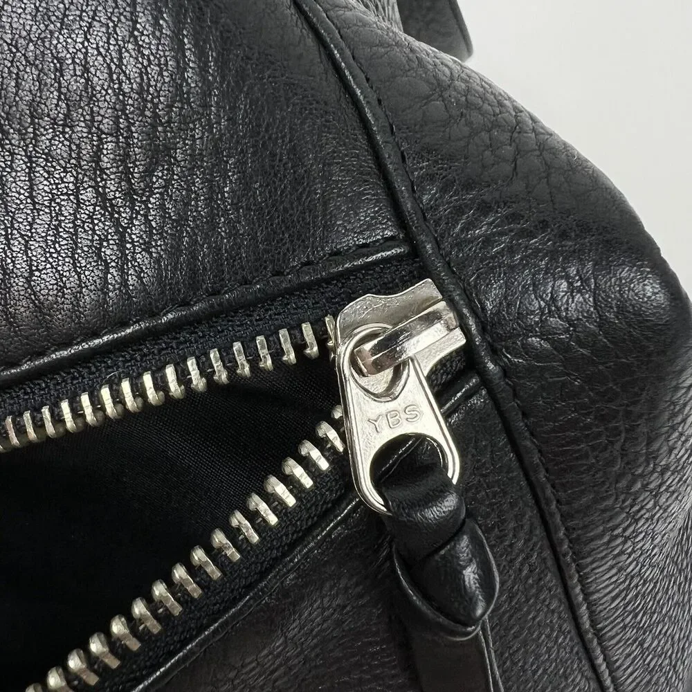 The Sak Hobo Shoulder Bag Pebbled Black Leather Pockets Signature Charm Roomy